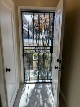 Entry, with security screen and new front door.
