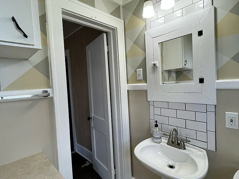 Half bath off of primary bedroom