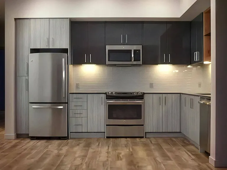 Island Countertop with Sink and Cabinet Storage in Apartment Kitchen