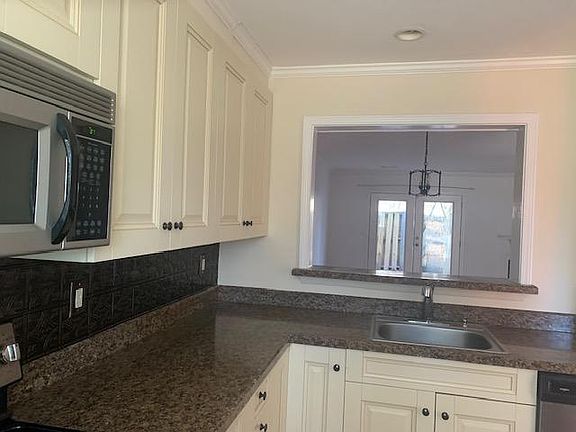 kitchen with opening to family room