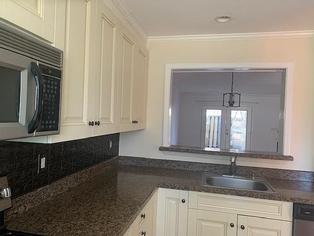 kitchen with opening to family room