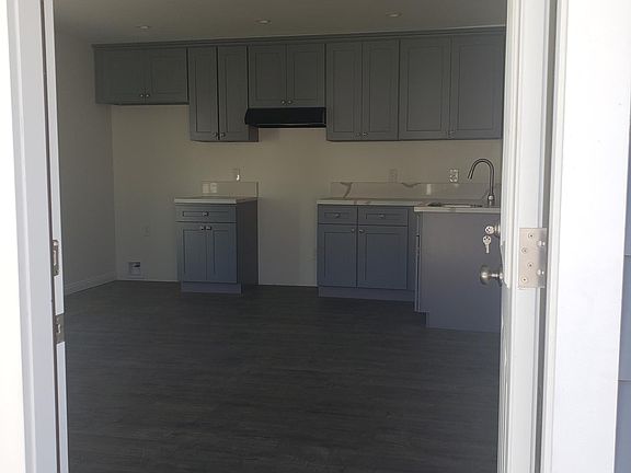 Main entrance, living, dining, kitchen.