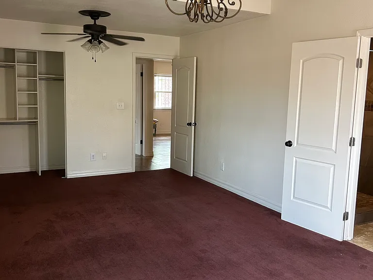 facing from back of master to entrance of room