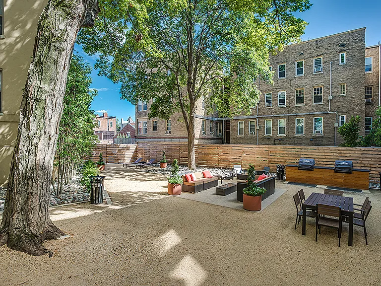 Courtyard with seating area and grills