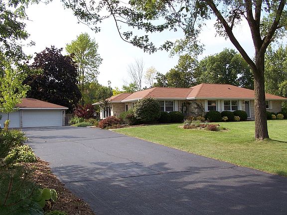 Front of Home + 3 Car Garage