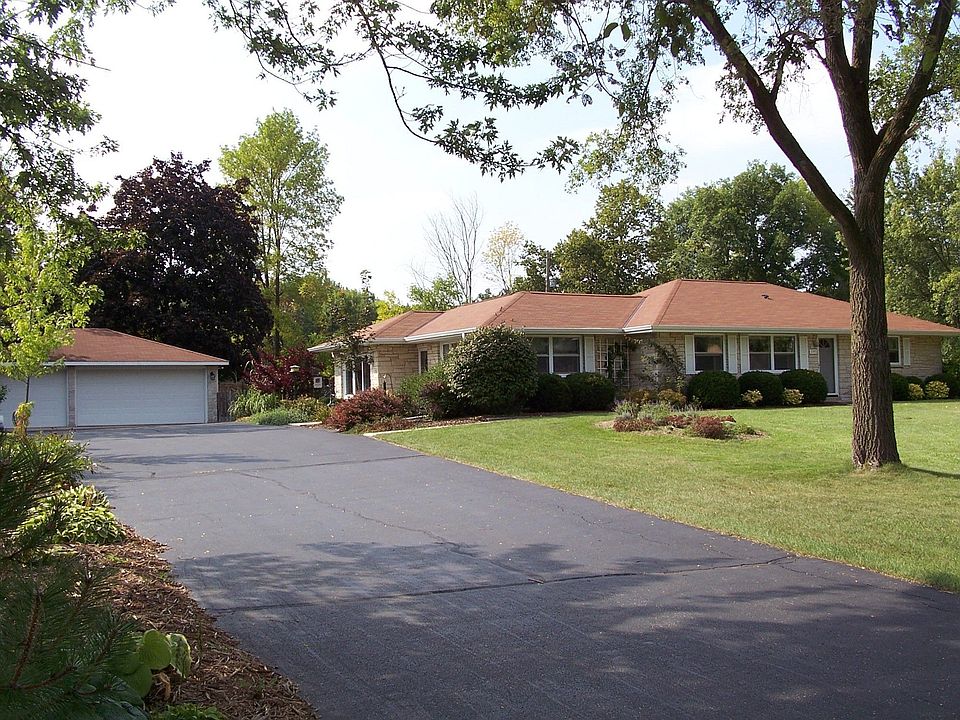 Front of Home + 3 Car Garage
