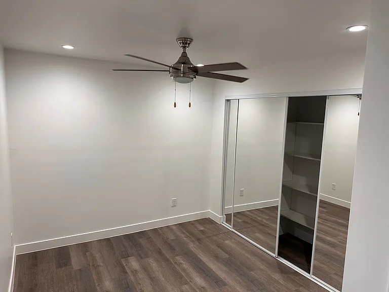 Large closet with built in shelving in Jr 1 bedroom
