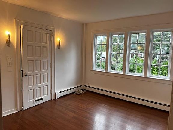 Come in through the original vintage front door, look to the left to admire the beautiful plants and flowers through 4 new windows. Mahogany vinyl flooring through out.