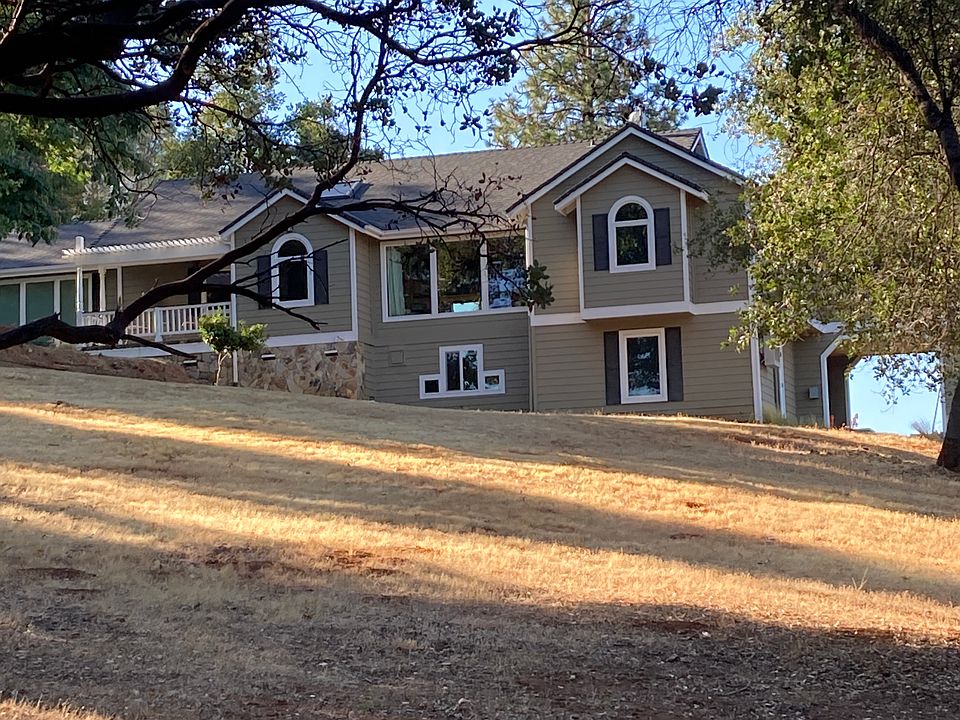 Partial front view of house. Your unit is the lower level, your driveway is off to the right (drive shown near the end of photos)