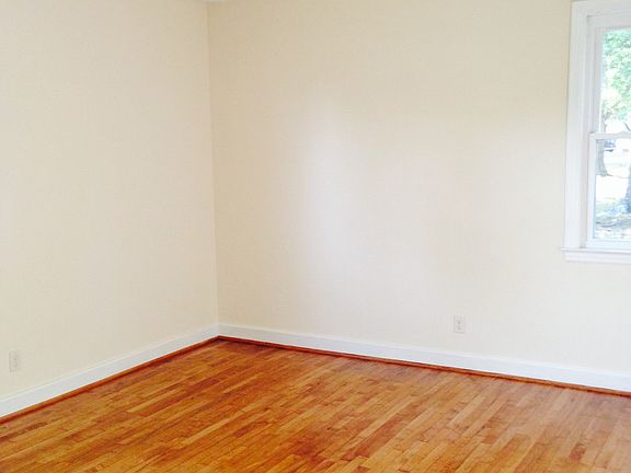 bedroom with hardwoods
