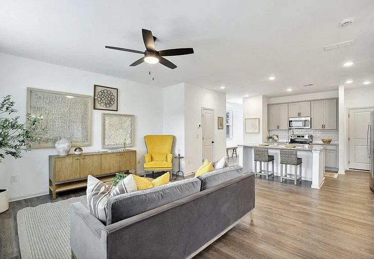 Comfortable living space designed for relaxation and easy flow into the kitchen.