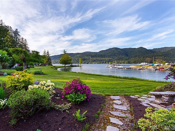 Enjoy an afternoon paddle/swim outside your sliding door or soak up some sun in your sunny beautifully mature landscaped yard.