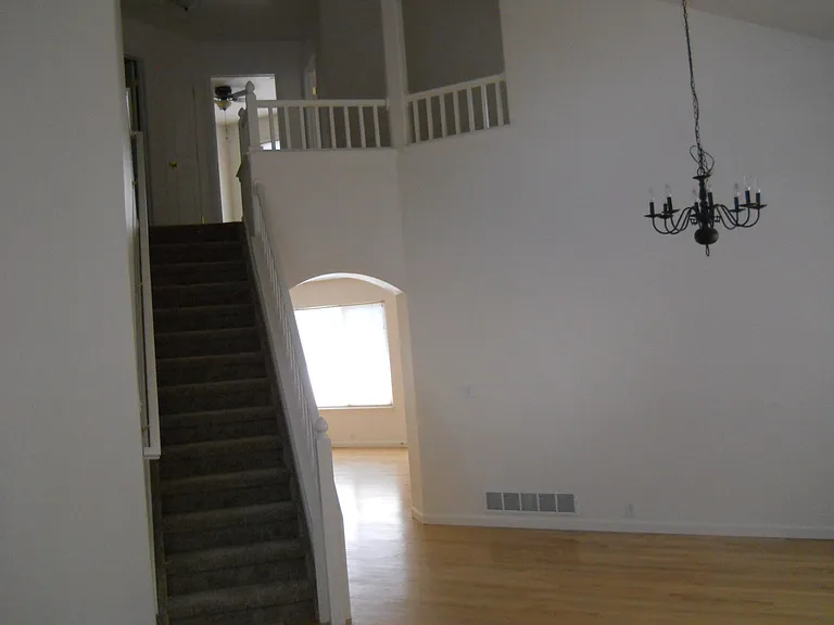 Hard wood on 1st floor; new carpet on stairs and 2nd floor.