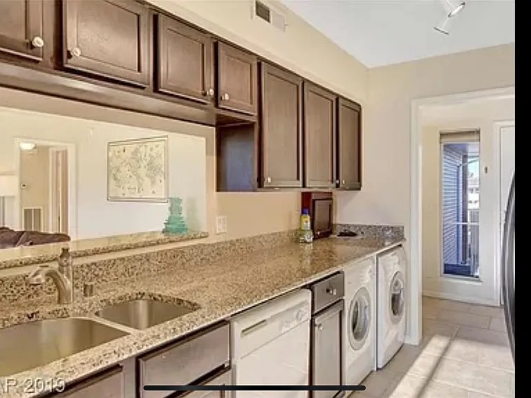 Kitchen (has a dishwasher, washing machine and a dryer)