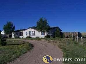 Front view; "U-shaped" driveway