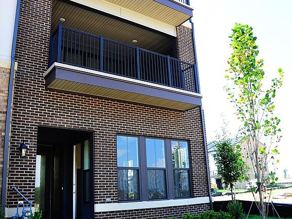 Front View with Terrace on Main Level, Master Bedroom, and L
