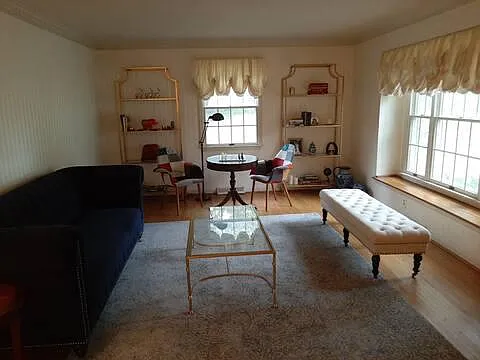 living room with a view to the front and the side of the house.