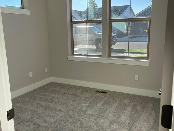 Light and bright office/bonus room near front door