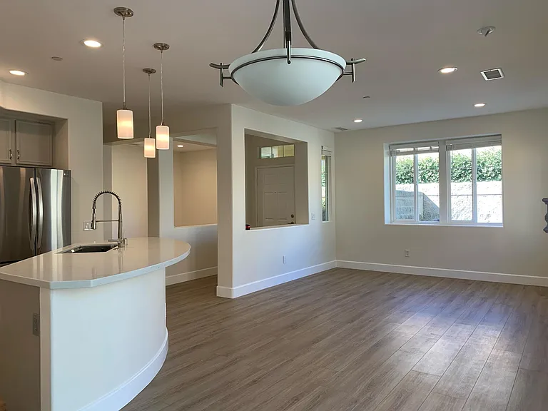 Entry, Opening wall to Extra Room, Kitchen, Living Areas