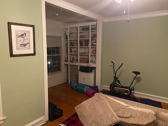 built in bookshelves in front room