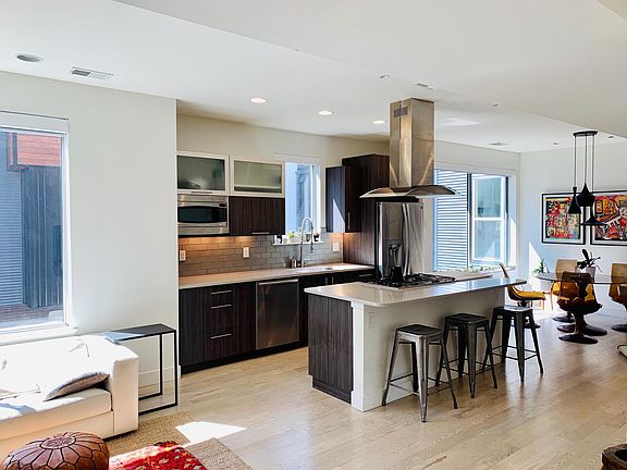 Open kitchen, living and dining rooms