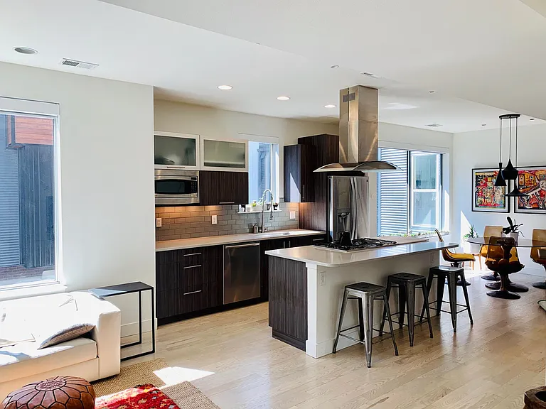 Open kitchen, living and dining rooms