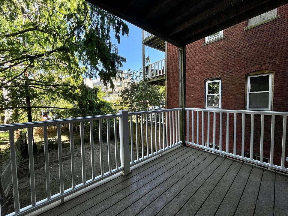 Private deck overlooking common yard