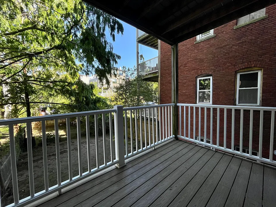 Private deck overlooking common yard