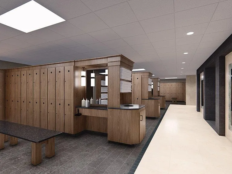 Luxurious locker rooms with private showers, complimentary terrycloth towels, and premium toiletries