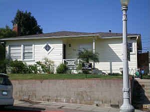 Front of house with gaslamp