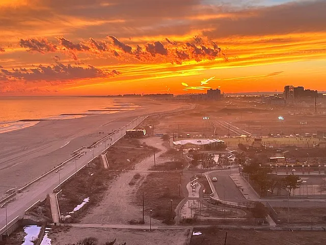 Sunset up the block on Beach 26 OCEANFRONT 40 steps away.