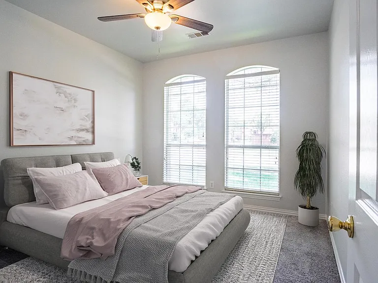 Bedroom 2. This image shows a virtually furnished space. Bedrooms come unfurnished.