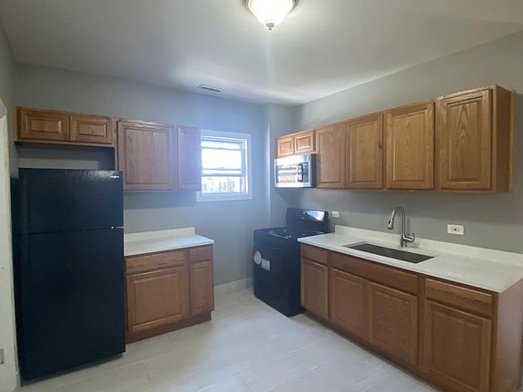 3rd image of 6403 S Campbell Ave APT 2R