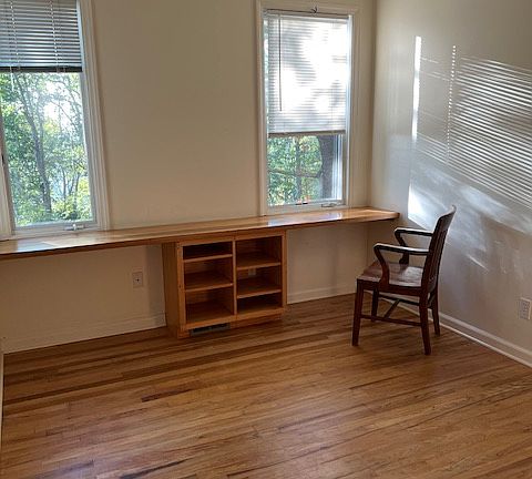 Downstairs bedroom with work area