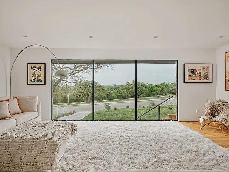 Floor to ceiling windows allow for ample natural light and evening star-gazing.