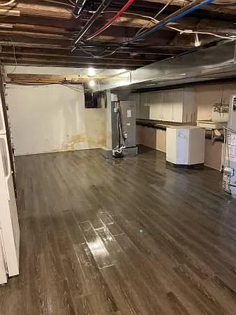 Basement (Extra refrigerator and washer/dryer located here)