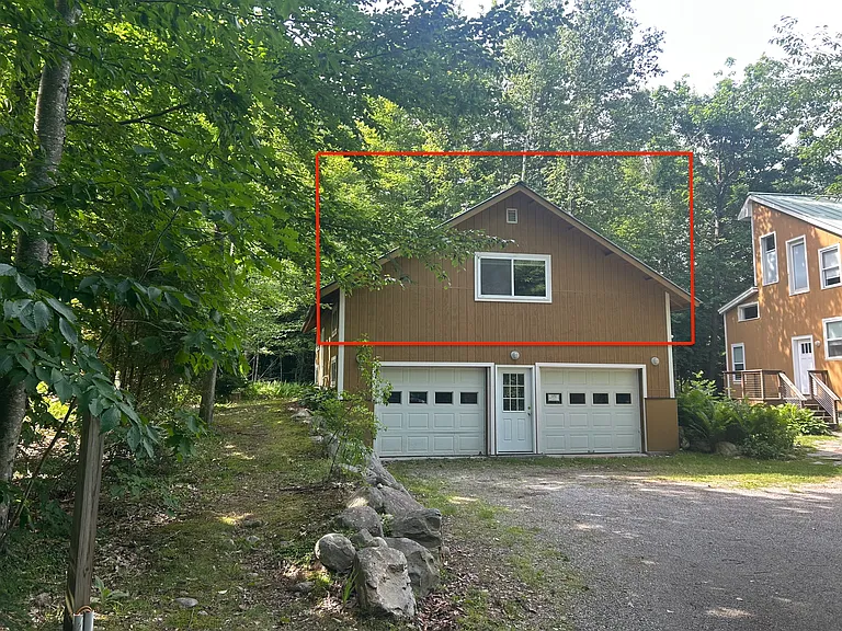 1 bedroom garage apartment with side and garage entries.