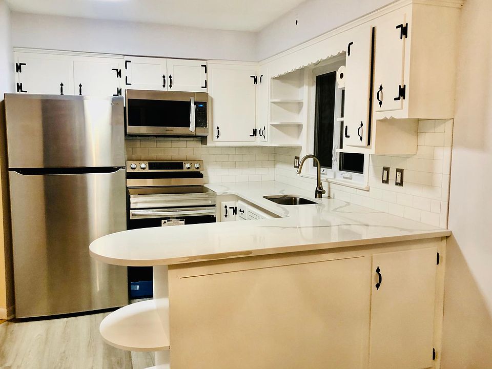 Bright and airy kitchen with separate eating area and new stainless appliances,