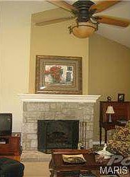 Great room has real stone fireplace! Vaulted ceiling!