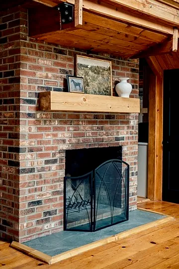 Firewood burning fireplace with mantle and hearth