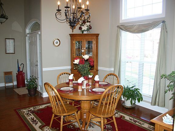 Formal dining room has 16 ft. ceiling.