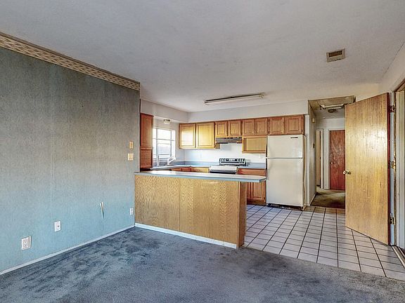 4th image of 6038 Staubach Ave NW