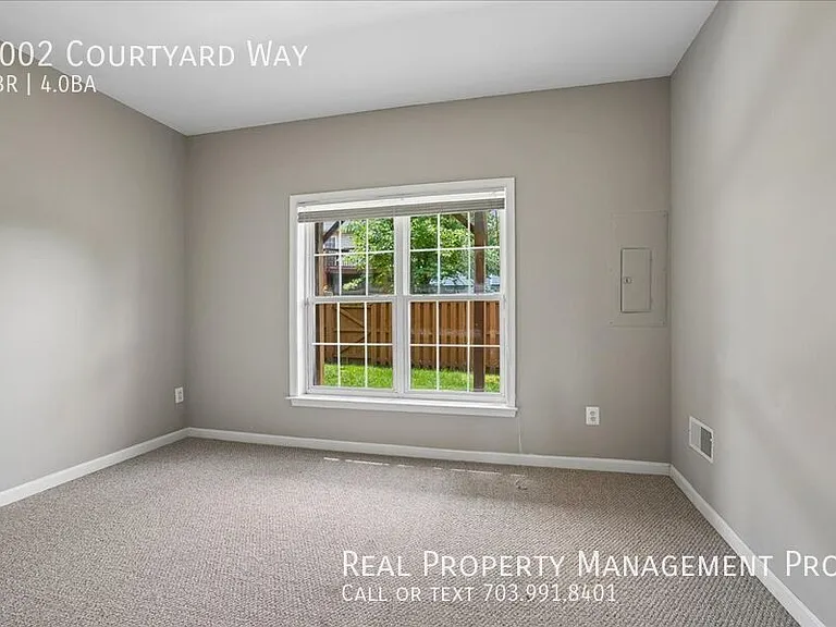 7002 Courtyard Way — Photo 29