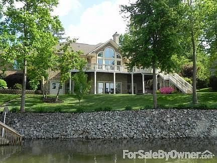 Rear View of House
						:
						Taken from boat on lake