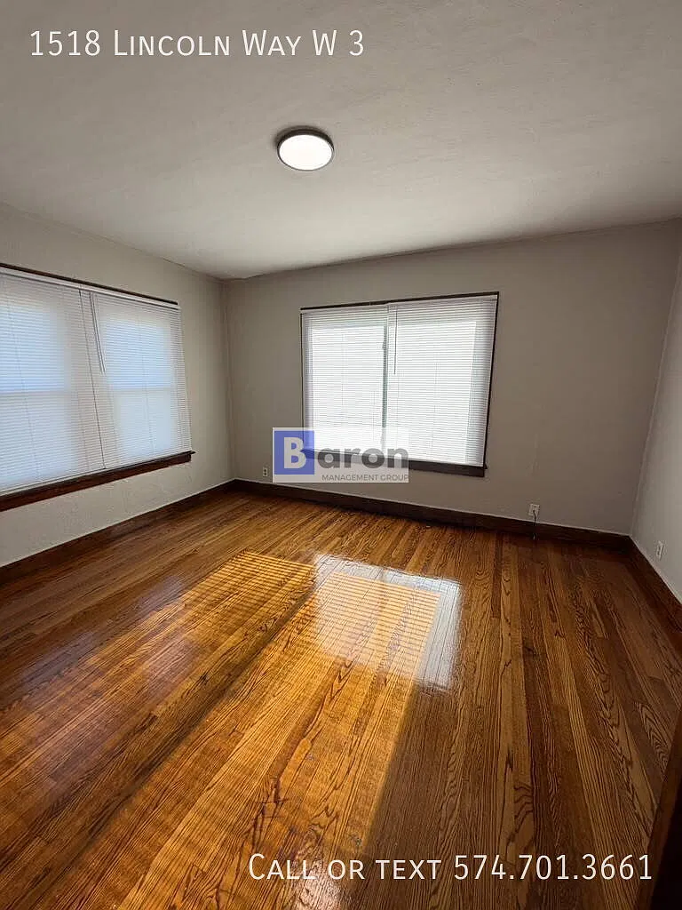 "Charming 1-Bed with Gleaming Hardwood Floors in South Bend!" — Photo 2