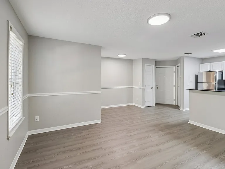 Spacious open-concept layout with kitchen and living area