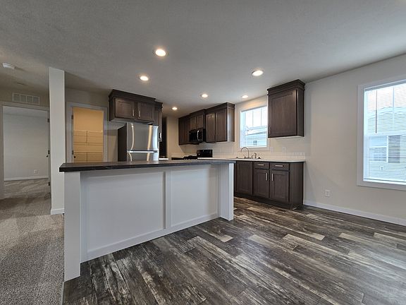 3rd image of 7204 E Grand River Ave Lot 409
