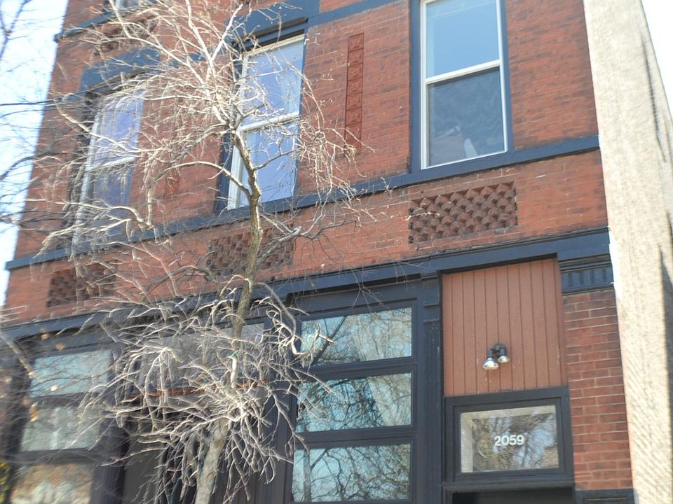 exterior of brownstone. Corner of Clifton and Dickens. !st and second floor