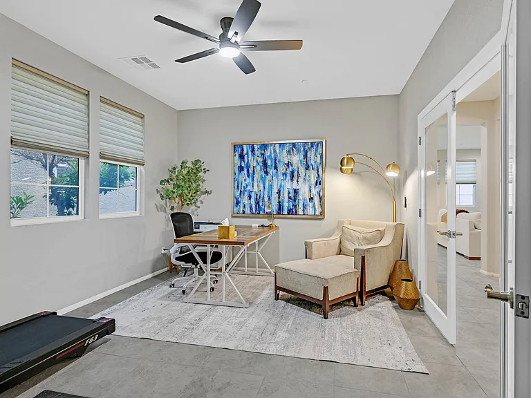 Dedicated executive office with printer and additional reading/sitting area