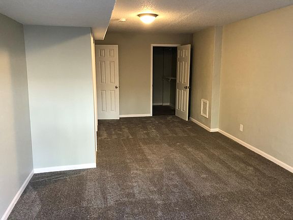 Basement bedroom with full bathroom.